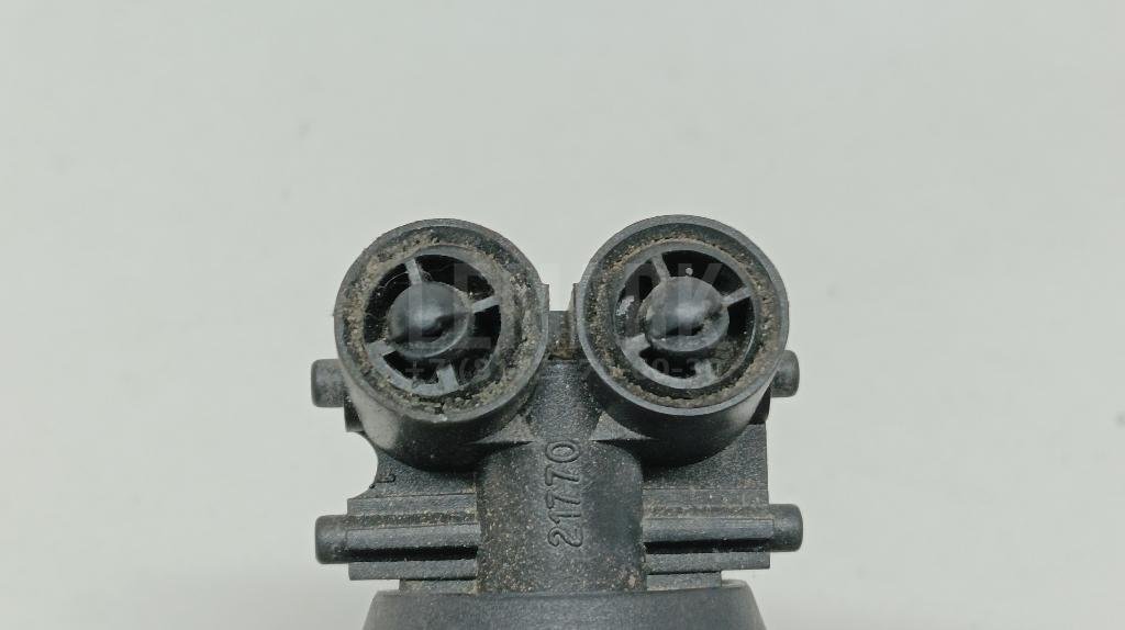 Форсунка омывателя фары