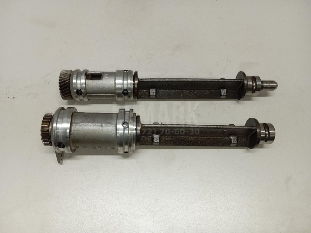 Вал балансирный