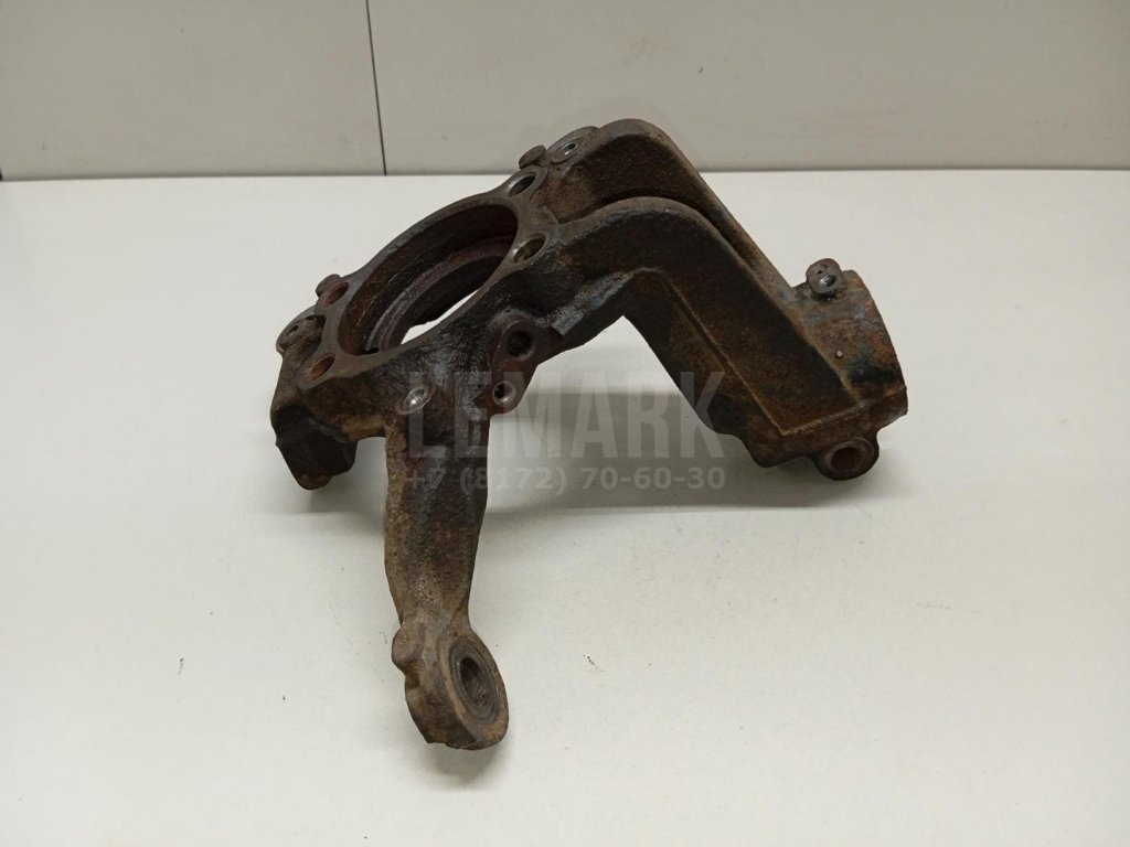 Кулак поворотный передний левый