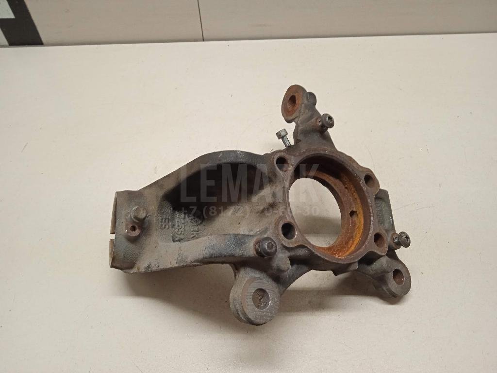 Кулак поворотный передний левый