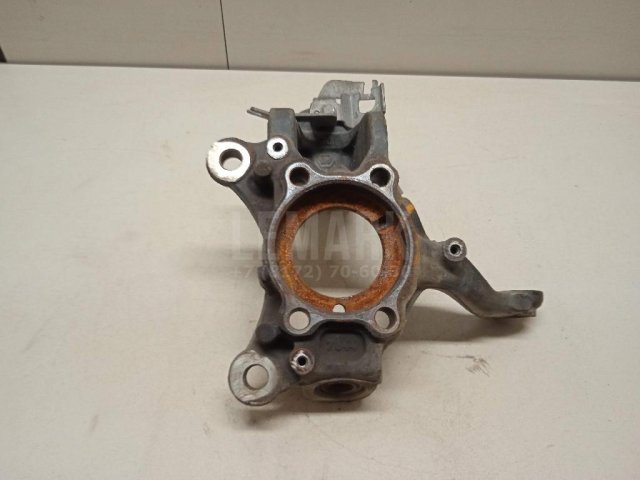 Кулак поворотный передний левый