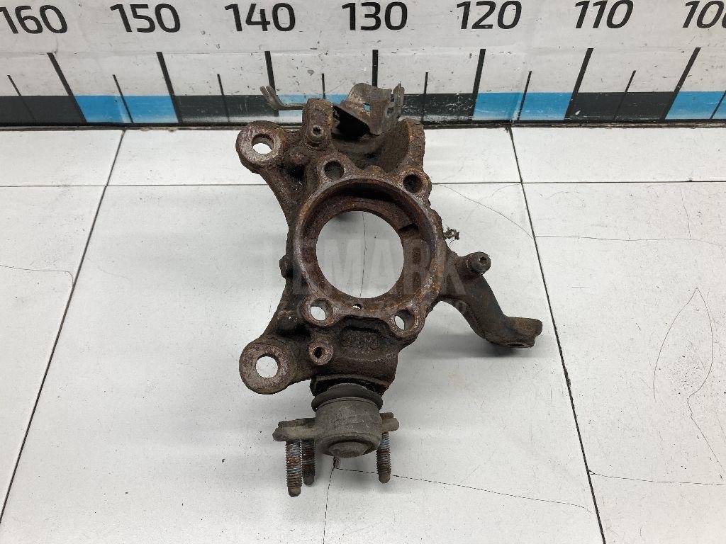 Кулак поворотный передний левый