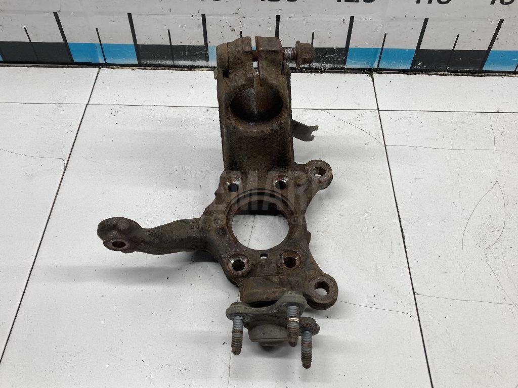 Кулак поворотный передний левый