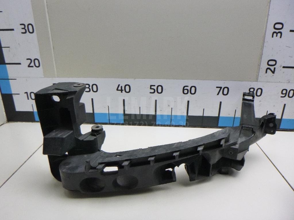 Кронштейн фар левый