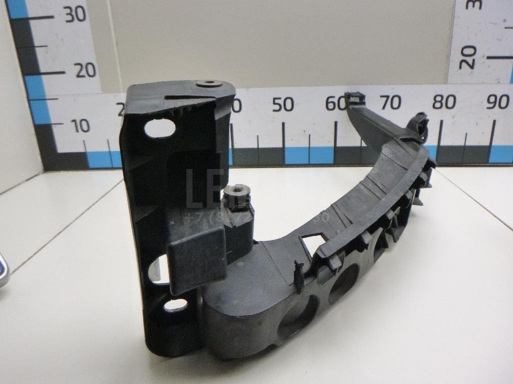 Кронштейн фар левый