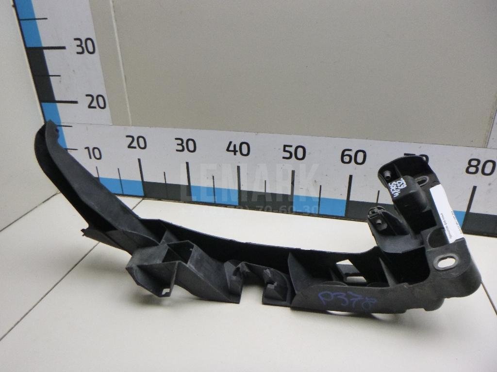 Кронштейн фар левый