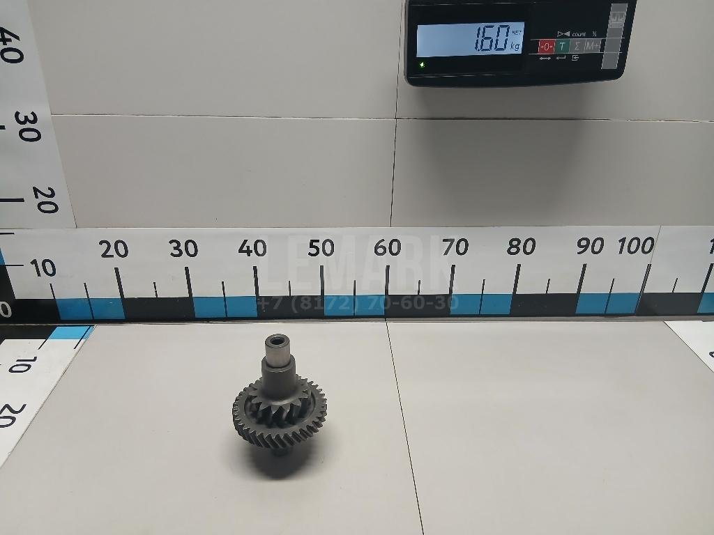 Ось шестерни задней передачи