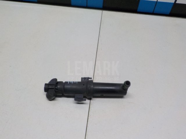 Форсунка омывателя фары