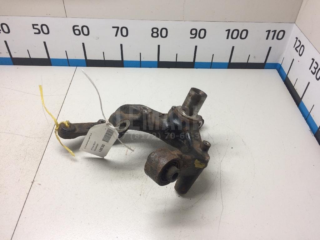 Кулак поворотный задний левый