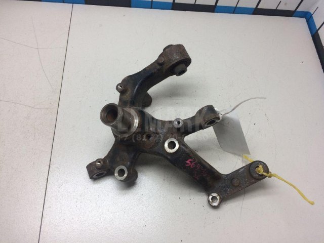 Кулак поворотный задний левый