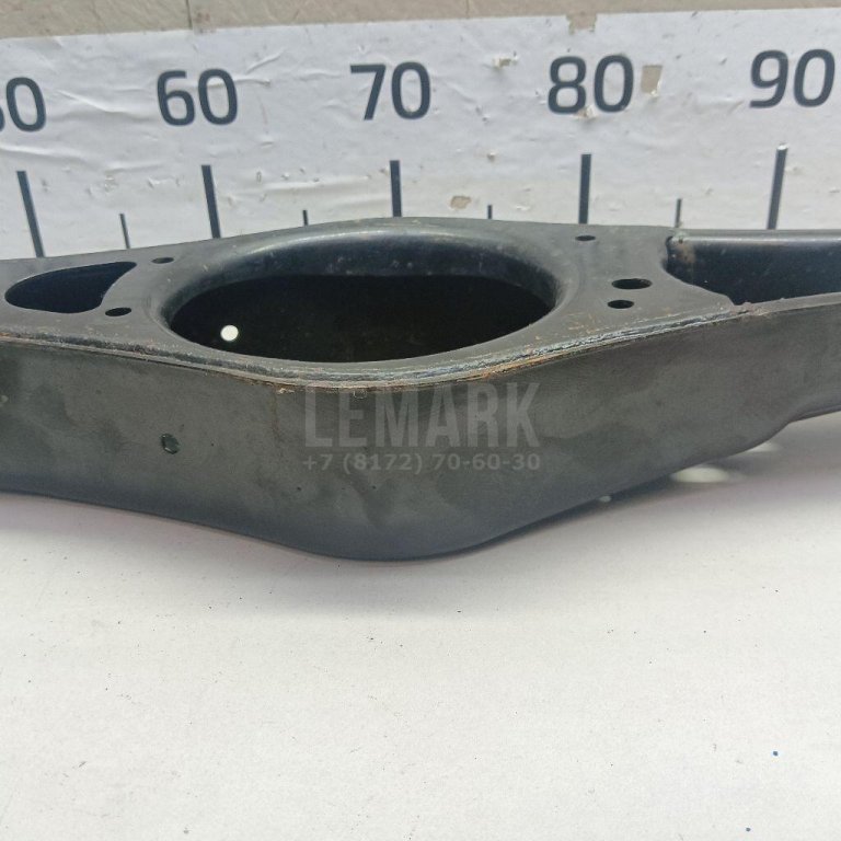 Рычаг задний нижний