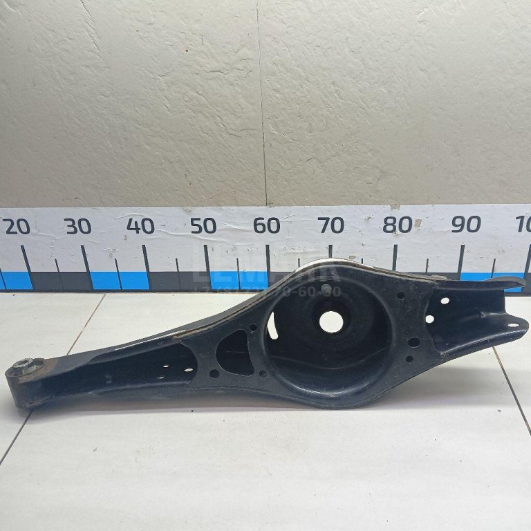 Рычаг задний нижний