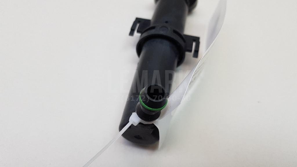 Форсунка омывателя фары