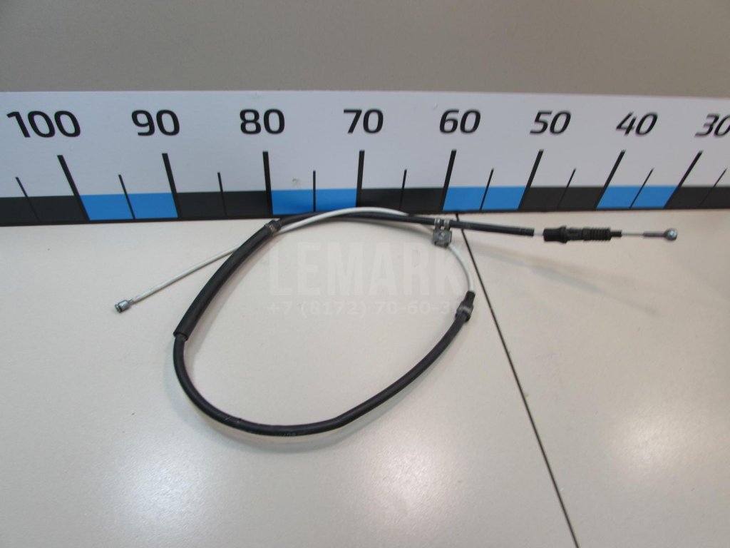 Трос стояночного тормоза