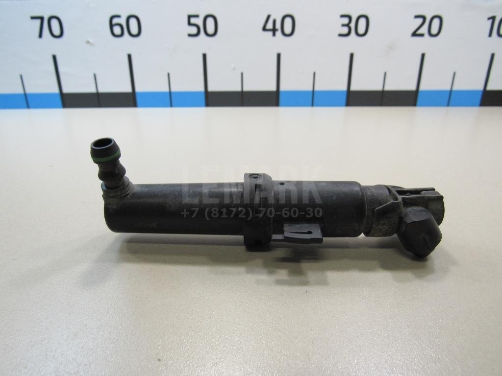 Форсунка омывателя фары