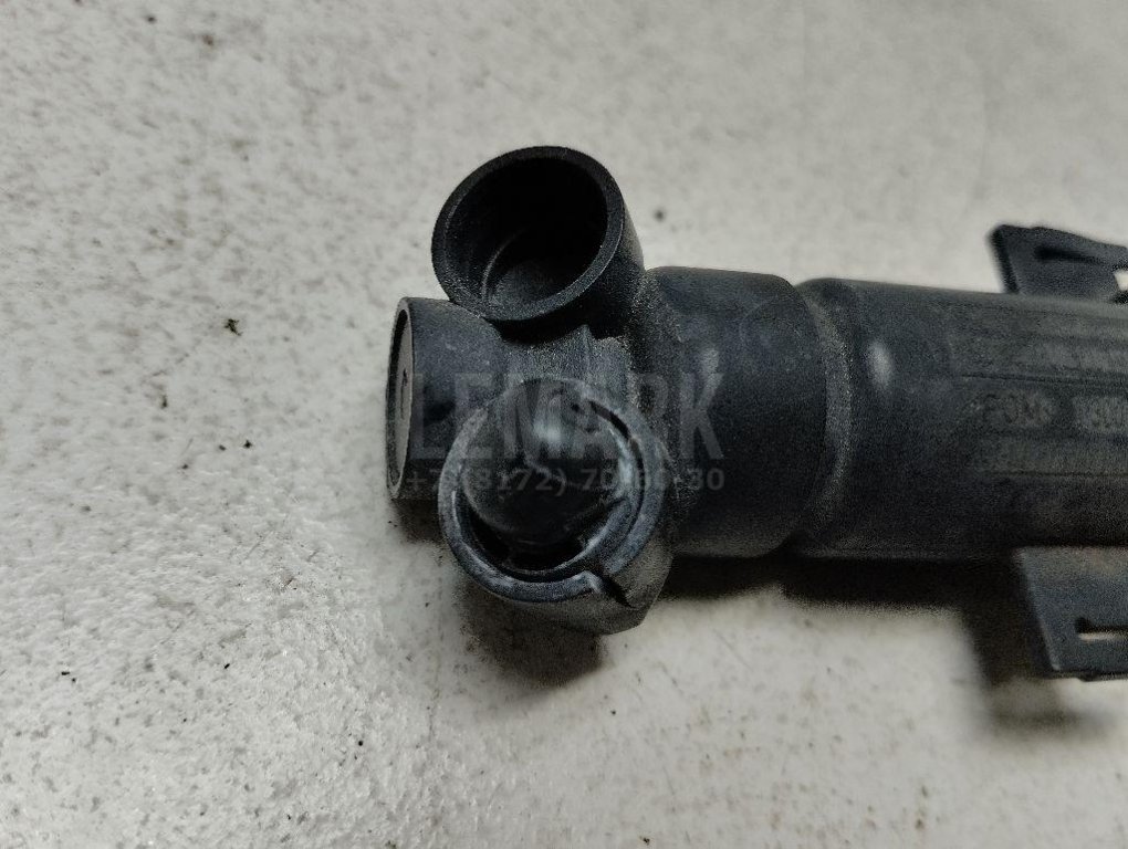 Форсунка омывателя фары