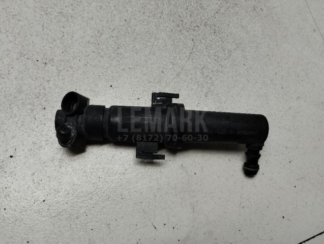 Форсунка омывателя фары