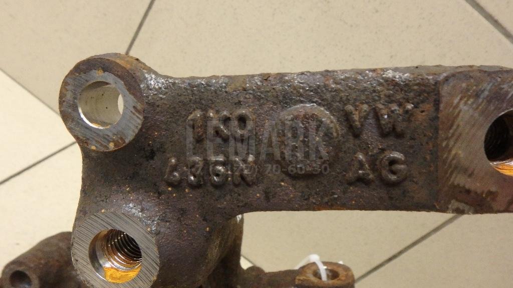 Кулак поворотный задний левый