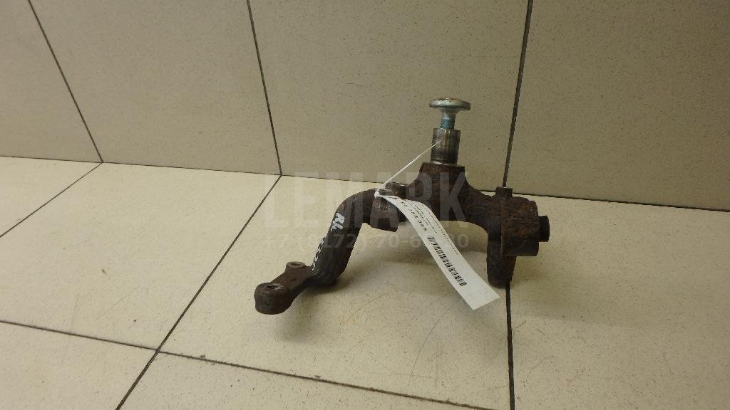 Кулак поворотный задний левый