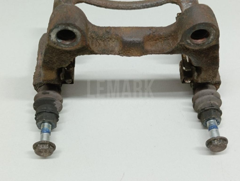 Скоба суппорта заднего