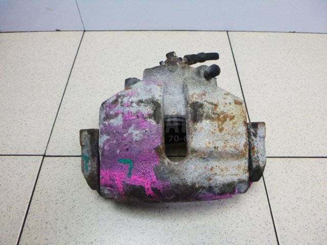 Суппорт тормозной передний левый