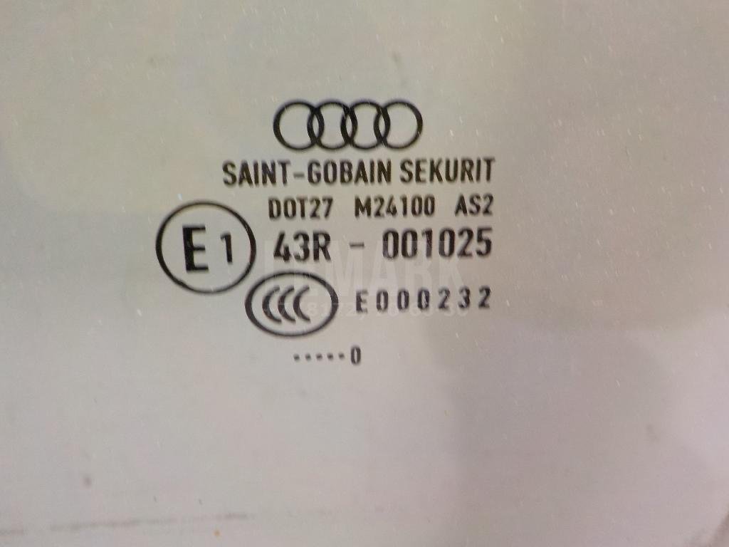 Стекло двери передней левой