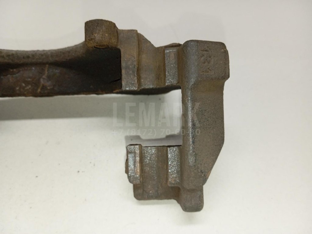 Скоба суппорта переднего