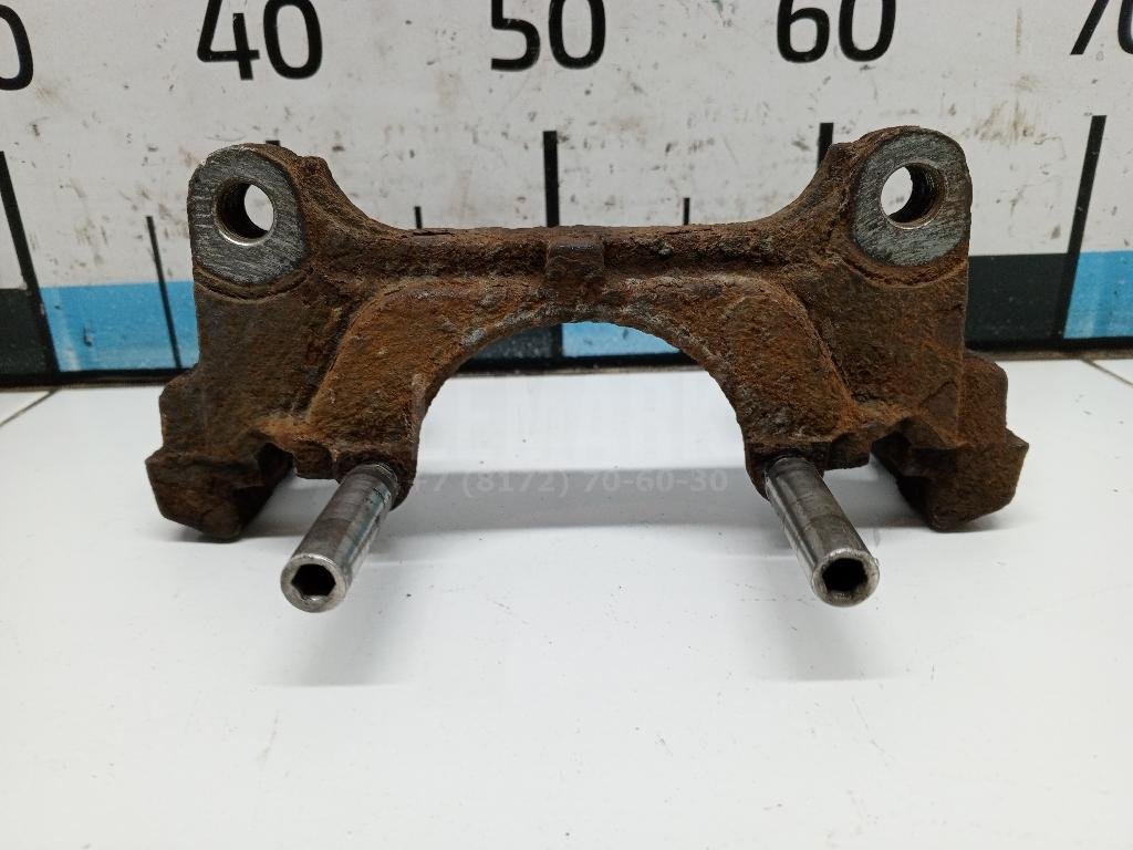 Скоба суппорта переднего