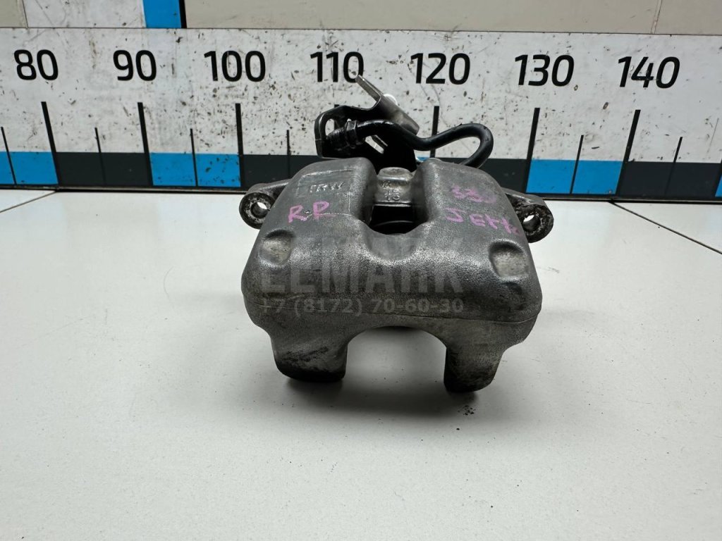 Суппорт тормозной задний правый