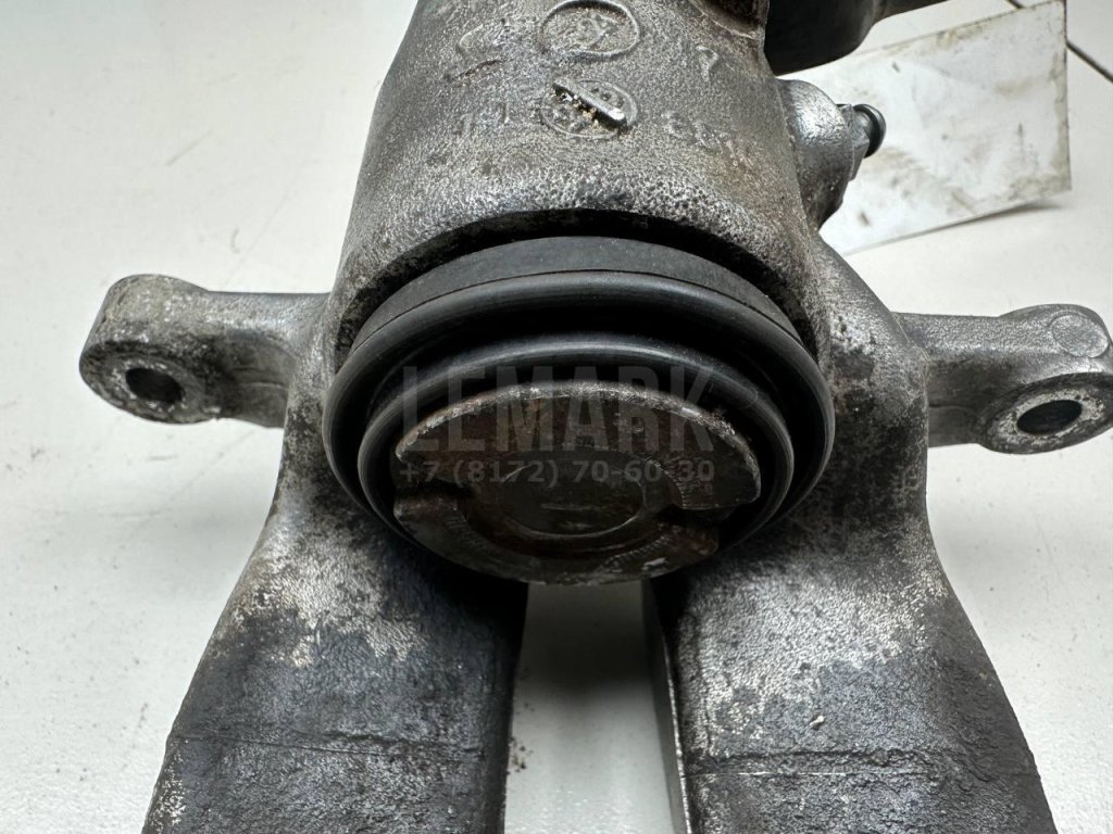 Суппорт тормозной задний правый