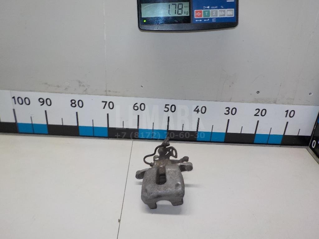 Суппорт тормозной задний левый