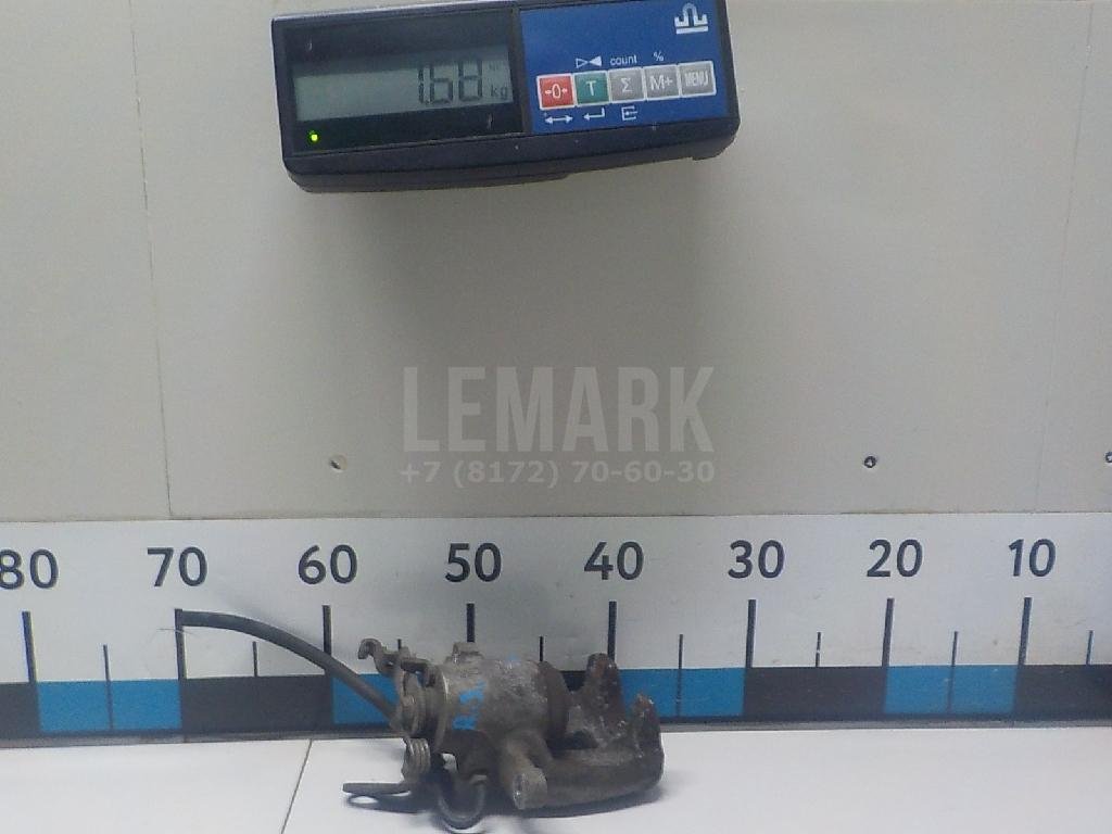 Суппорт тормозной задний правый