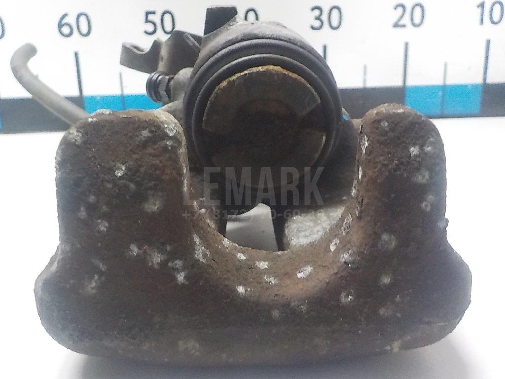 Суппорт тормозной задний левый