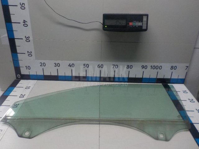 Стекло двери передней левой