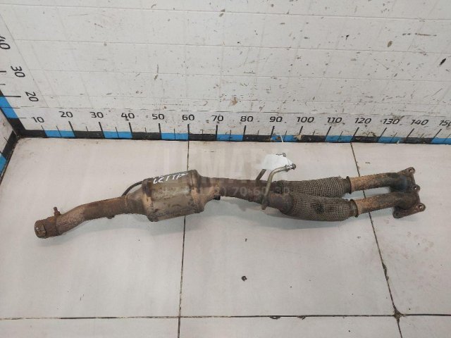 Приемная труба глушителя