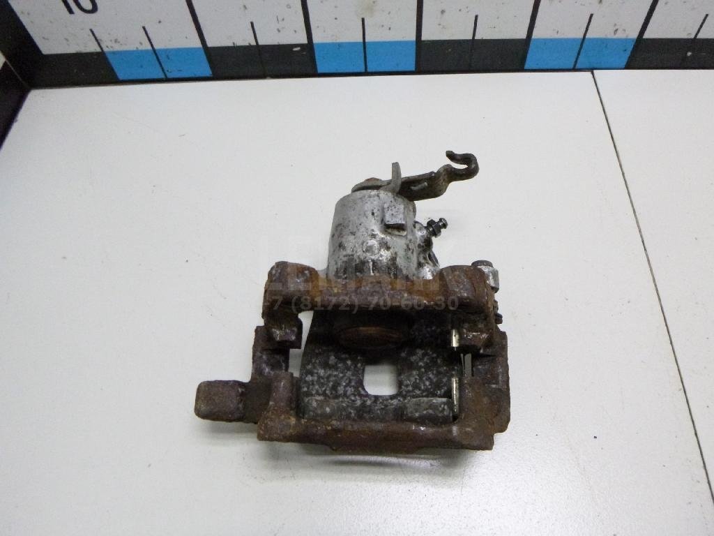 Суппорт тормозной задний правый