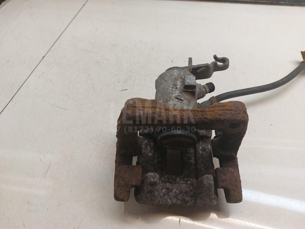 Суппорт тормозной задний левый