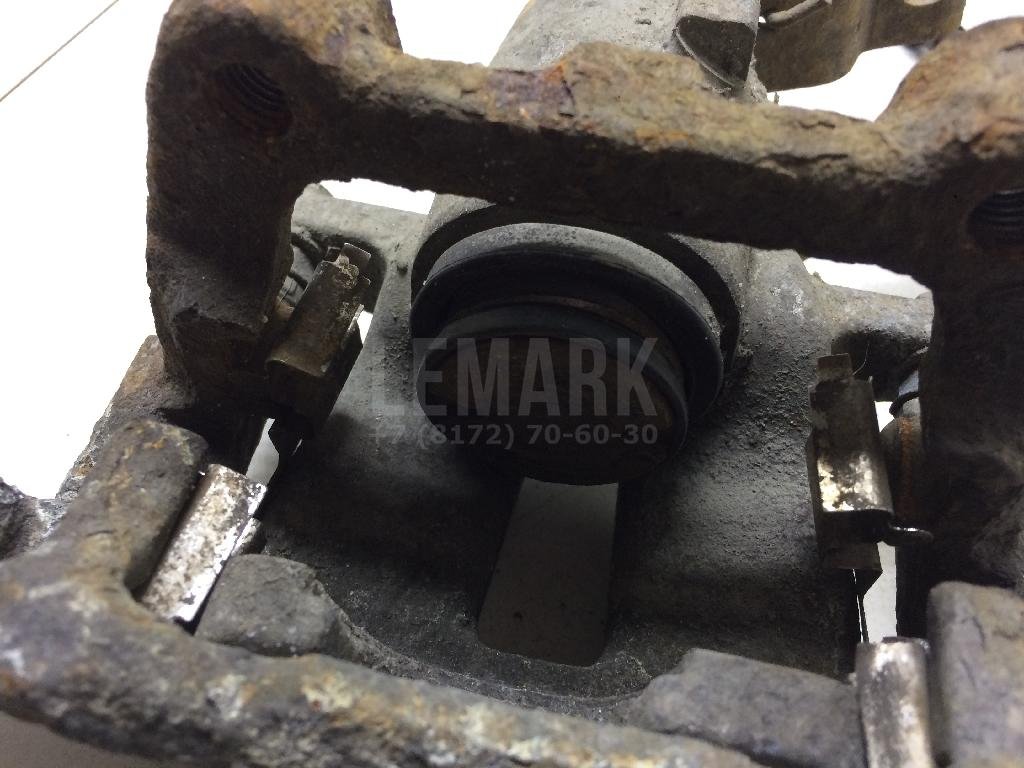 Суппорт тормозной задний правый