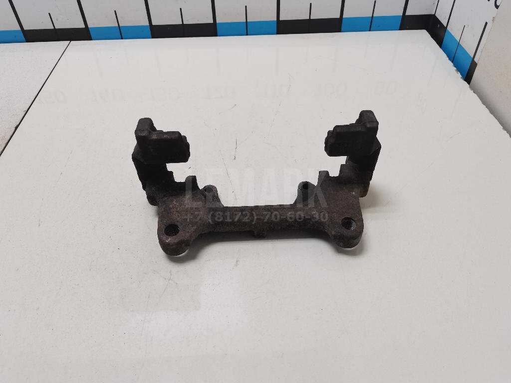 Скоба суппорта переднего