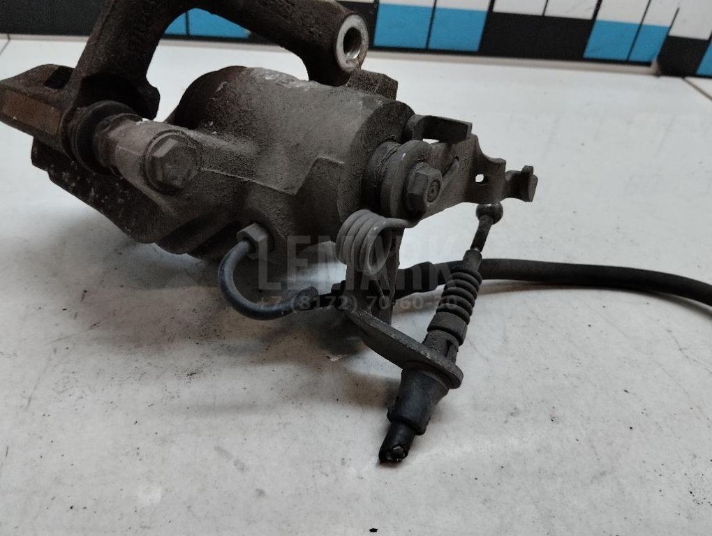 Суппорт тормозной задний левый