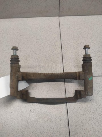 Скоба суппорта переднего левого