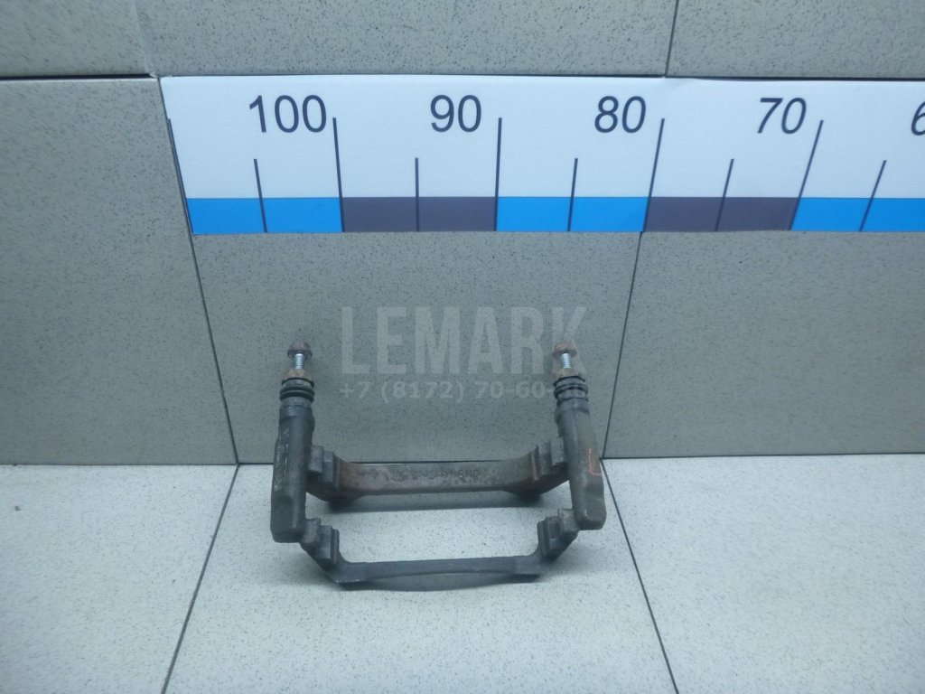 Скоба суппорта переднего левого