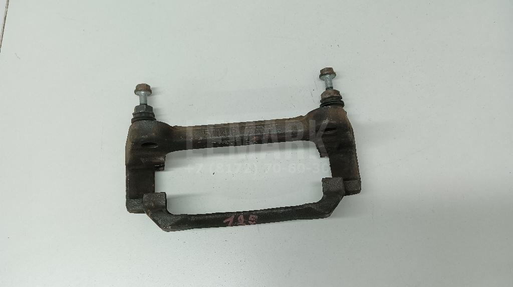 Скоба суппорта переднего левого