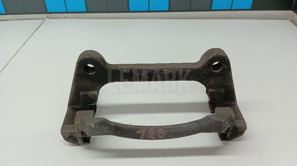 Скоба суппорта переднего левого