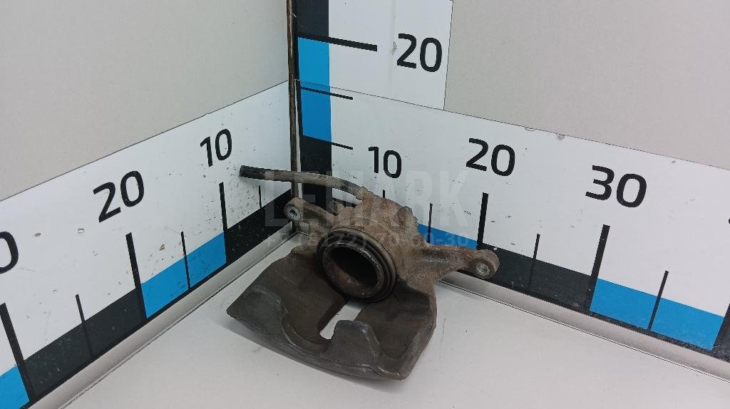 Суппорт тормозной передний левый