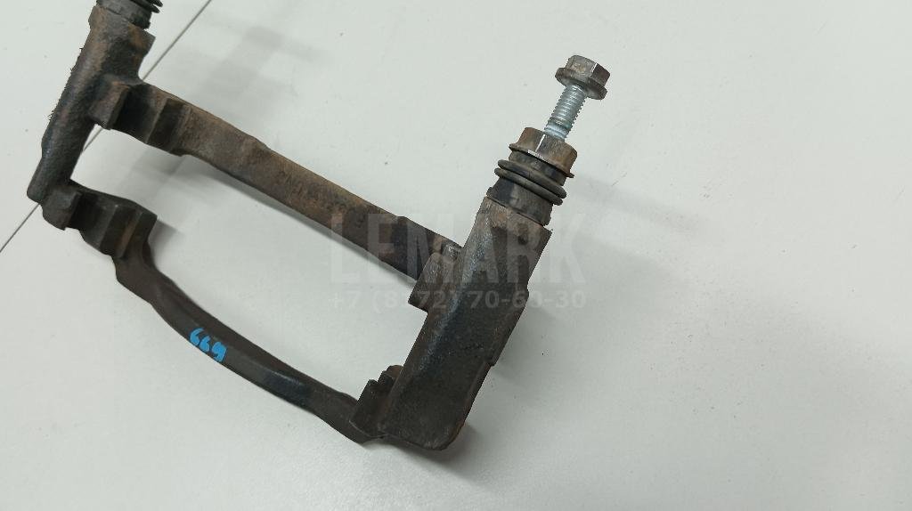 Скоба суппорта переднего левого