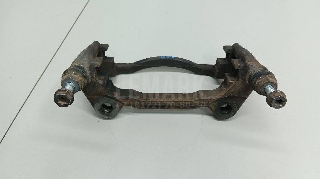 Скоба суппорта переднего левого