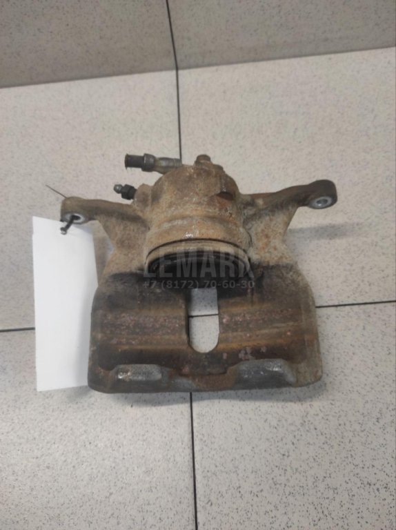 Суппорт тормозной передний левый
