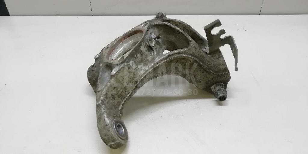 Кулак поворотный передний левый