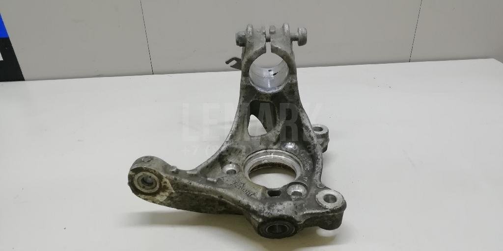 Кулак поворотный передний левый